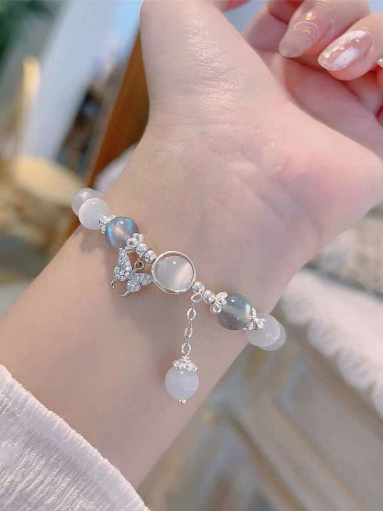 Celestial Harmony Bracelet: Natural Crystal Beads with Butterfly & Cat's Eye Stone